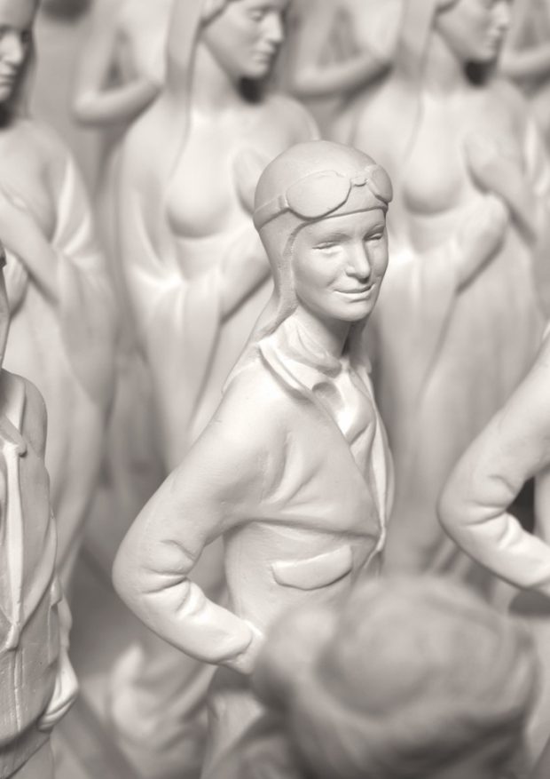 Repetitive, gypsum statuettes with characters from calendar