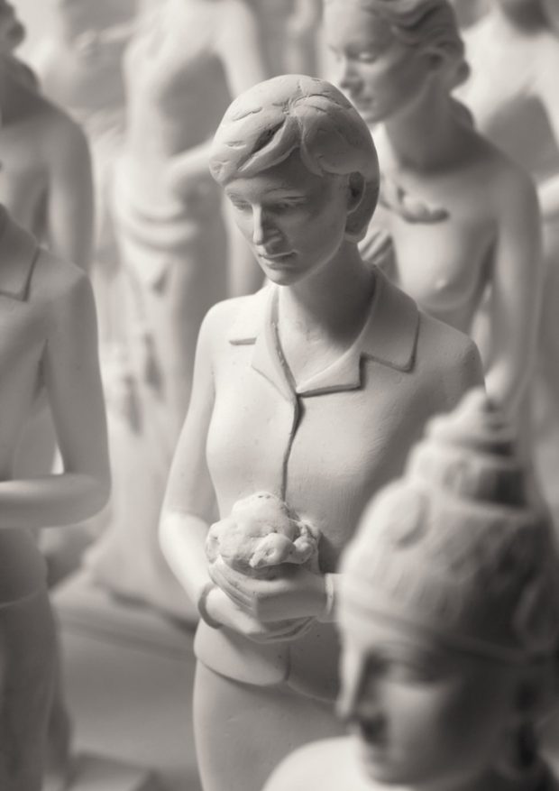 Repetitive, gypsum statuettes with characters from calendar